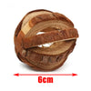 A round wooden chew toy made of natural wood, used as a rodent toy.