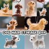 Sammlung von Welpe-Haar-Gedächtnis-Anhängern und einer Hundehair-Aufbewahrungsbox mit goldenen und grauen Welpen.