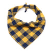 A yellow and navy plaid cotton dog bandana tied around the neck.