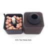 Black filter housing with filter media balls and an air pump connection