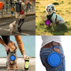 A portable silicone pet feeder bowl with a carabiner is shown being held by a person and attached to a denim pocket.