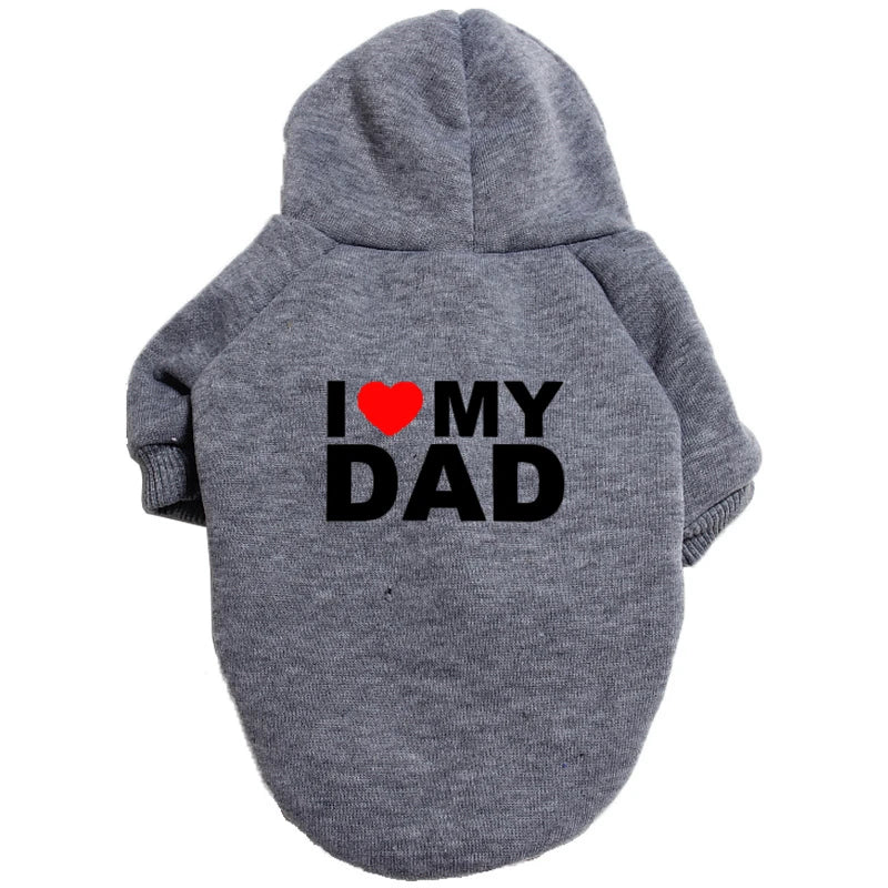 A gray plush coat with the text I love my dad embroidered on the back.