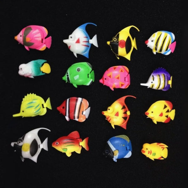 A collection of ten colorful, lifelike floating artificial tropical fish for aquarium decor.