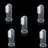 A set of silicone finger toothbrushes for dogs, showing various sizes and angles of the brush head.