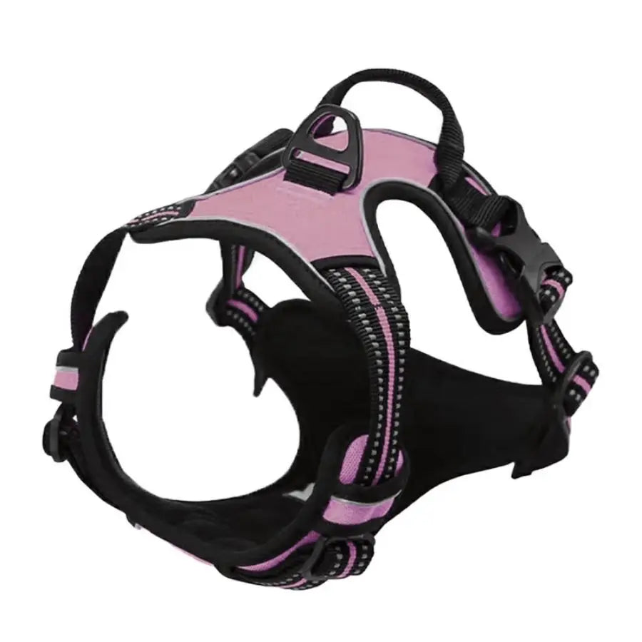 A pink and black adjustable no-pull dog harness with reflective strips and a handle.