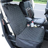Black waterproof dog car seat cover with a mesh window and side zippers installed in a vehicle seat.