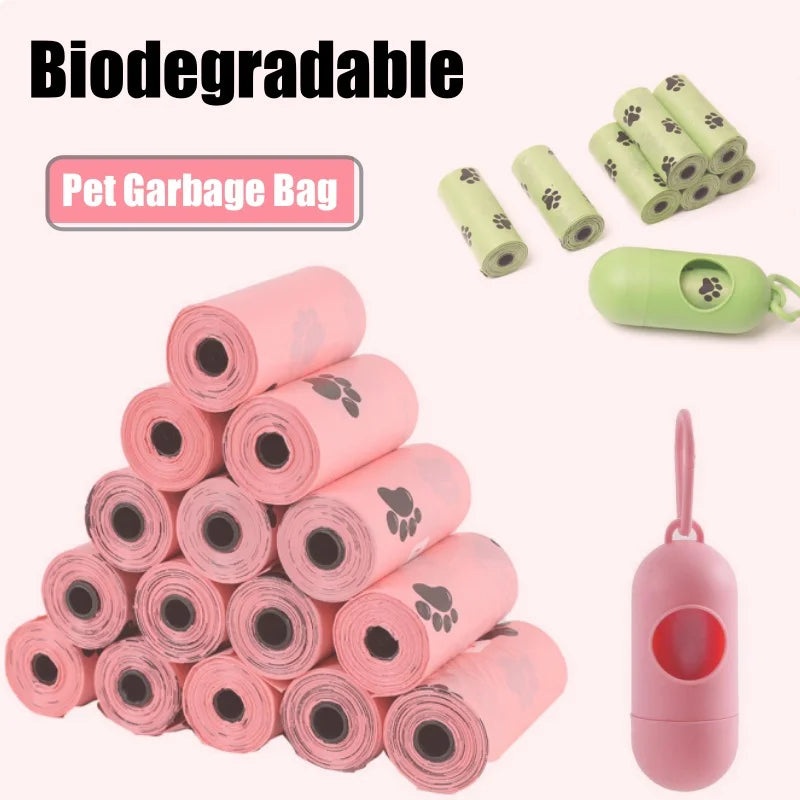 A stack of pink biodegradable pet garbage bags and a green dispenser for dog waste bags.