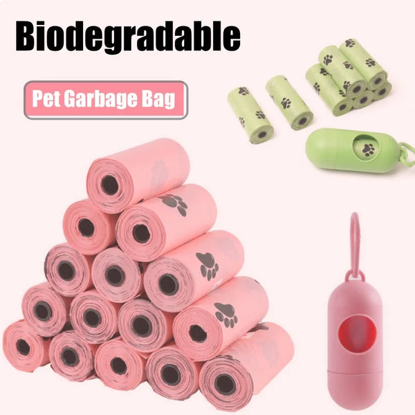 A stack of pink biodegradable pet garbage bags and a green dispenser for dog waste bags.
