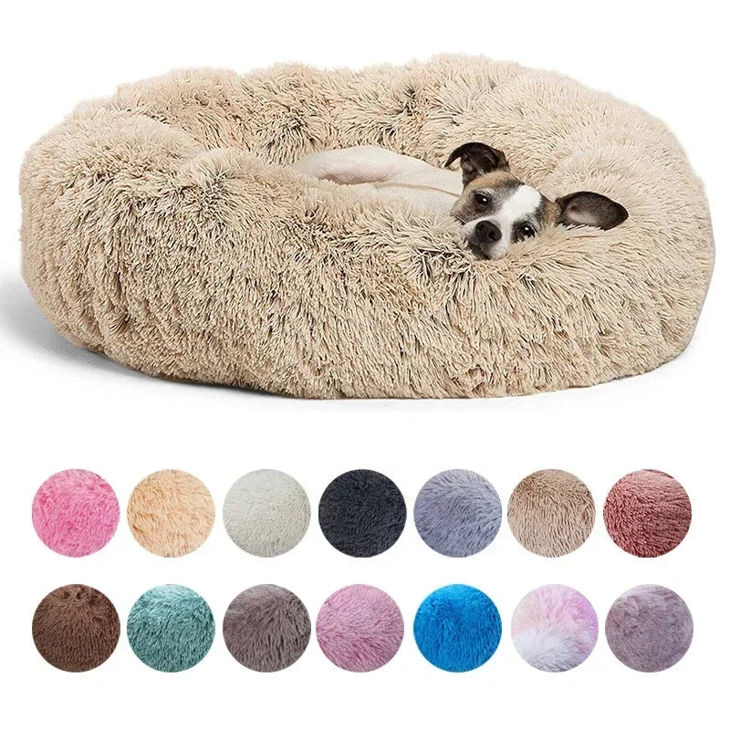 A beige ultra-soft plush pet bed filled with fluffy material, shown alongside a variety of colored pet beds.