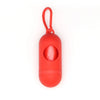 Red capsule-shaped dog poop bag dispenser with a carabiner clip.