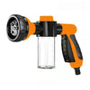 An orange high-pressure foam cleaning gun with a clear tank and black components.