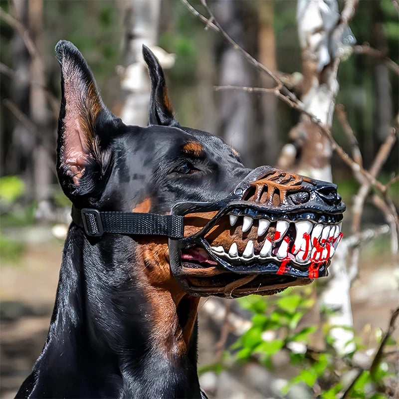 A black dog wearing a realistic, bloody-looking muzzle costume for pets.