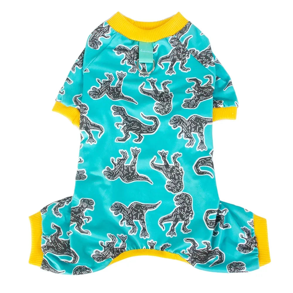 A turquoise soft cotton dog pajama set with a yellow trim featuring a repeating pattern of black and white dog silhouettes.