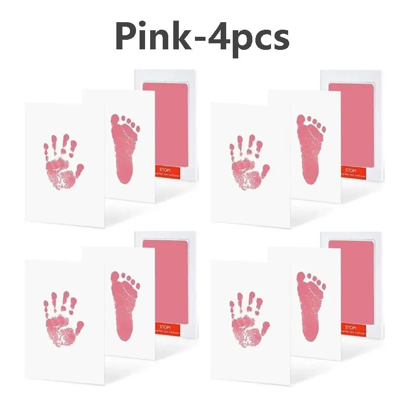 Pink handprint and footprint kits with white borders for keepsakes