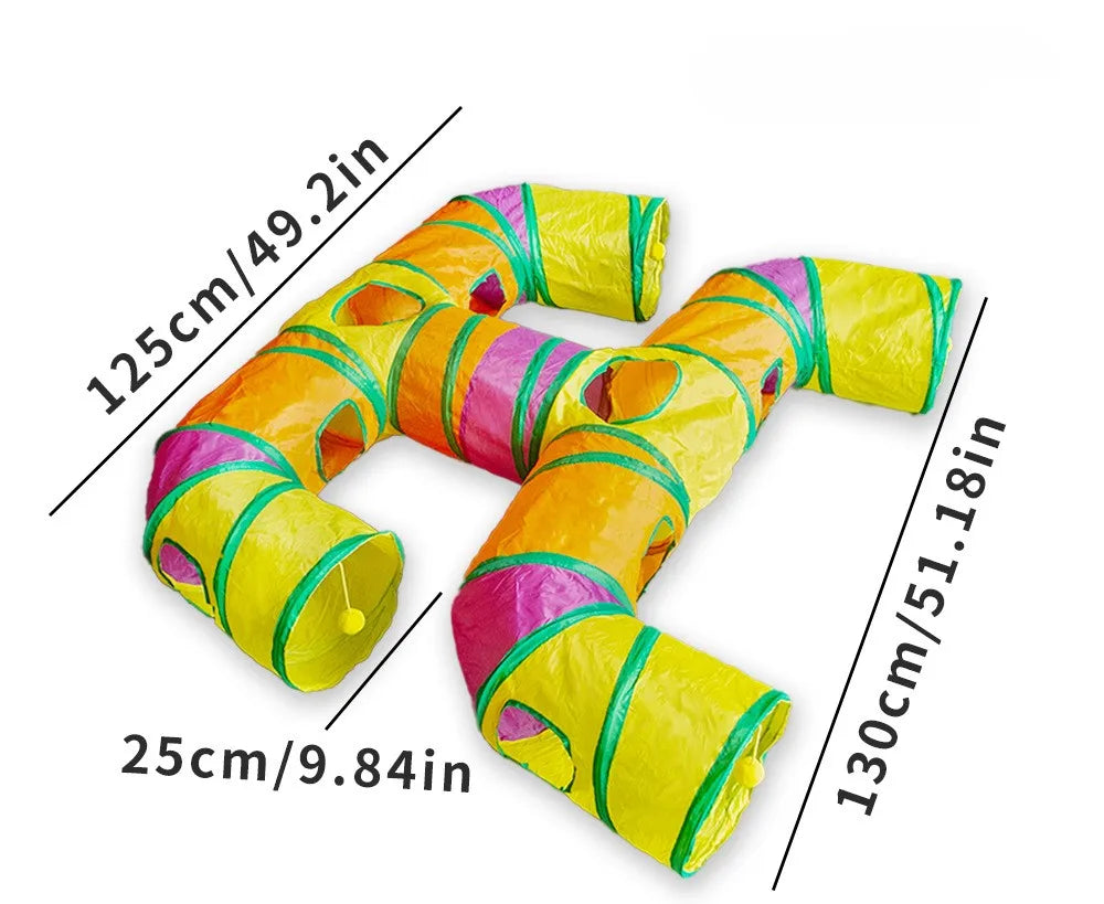 A yellow and green foldable cat play tunnel for indoor exercise, shown in a curved shape.