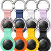 A set of silicone airtag protective covers with metal keychains in various colors including pink, blue, white, purple, orange