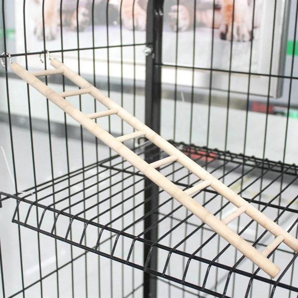 A wooden bird ladder with hooks is shown inside a black wire cage.