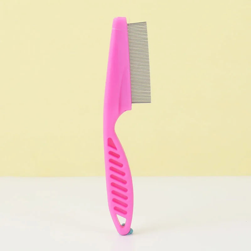 A pink one-button pet hair removal brush with a metal comb is shown against a light yellow background.