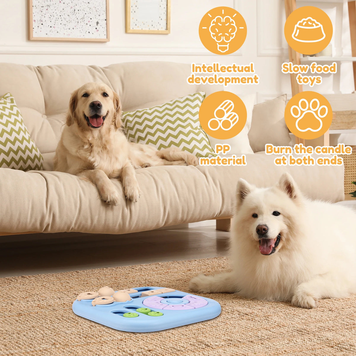 A white dog is shown next to an interactive puzzle toy for dogs on a rug.