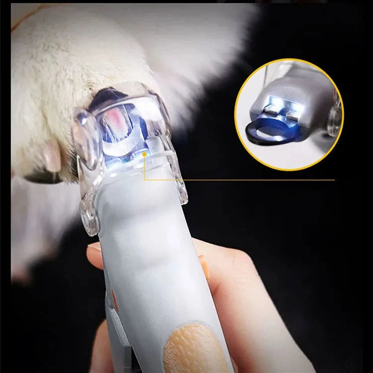 A hand holds a professional LED pet nail clipper, showing the device and an inset of its working mechanism.