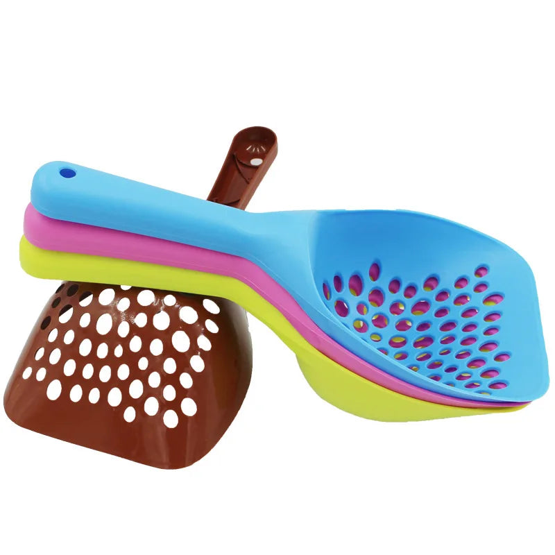 A plastic cat litter scoop with a multi-colored handle and a brown scoop, shown against a white background.