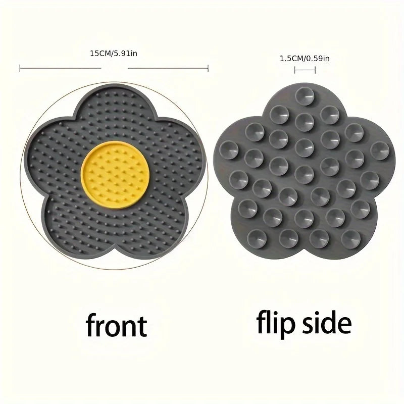 Front and flip side views of a silicone lick mat for dogs and cats with a flower design