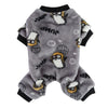 Gray fuzzy winter overalls for a small dog featuring jump themed patterns