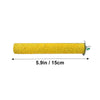 A cylindrical, golden-yellow natural wooden perch stand for parrots and birds.