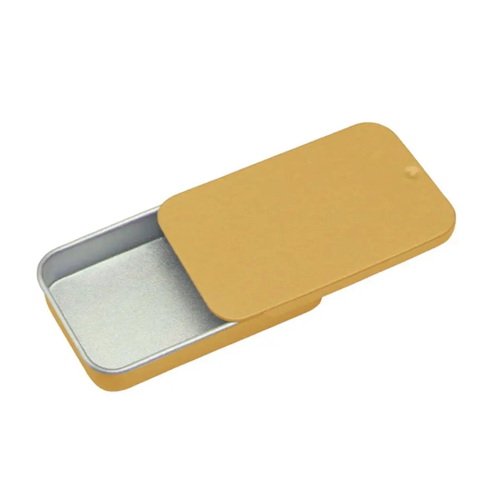 A rectangular, gold-colored sliding lid tin box with a silver interior, shown at an angle.