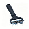 A black pet detangler comb and grooming brush with a handle and a metal comb attachment.