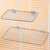 Stainless steel bird perch platform with wire mesh grid mounted on a wall