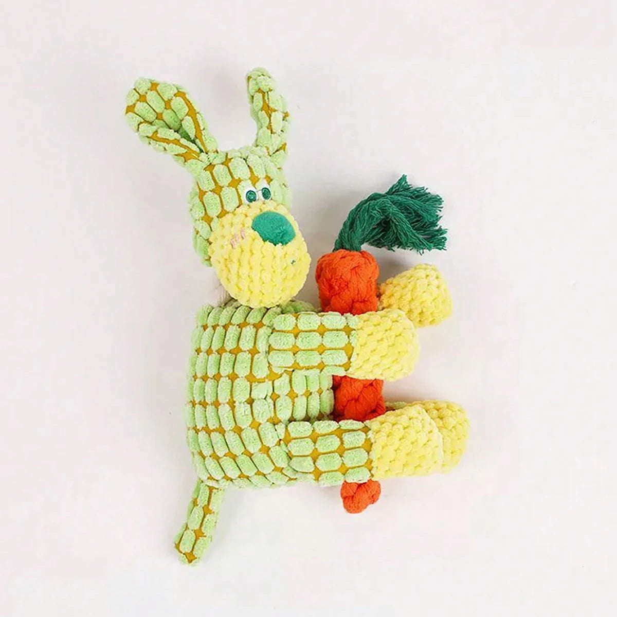 A handmade plush toy of a donkey with green and yellow textured fabric.
