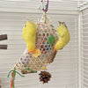A yellow parrot chewing toy with a bamboo frame and colorful shredded paper hanging in a white grid