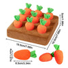 An interactive snuffle mat for pets shaped like carrots, featuring orange and green colors.