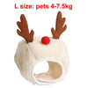 Accesorio de cabeza de piel sintética blanca con astas marrones y pompón rojo para disfraz navideño.