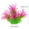 Une plante aquatique artificielle vibrante avec du feuillage rose vif et vert.