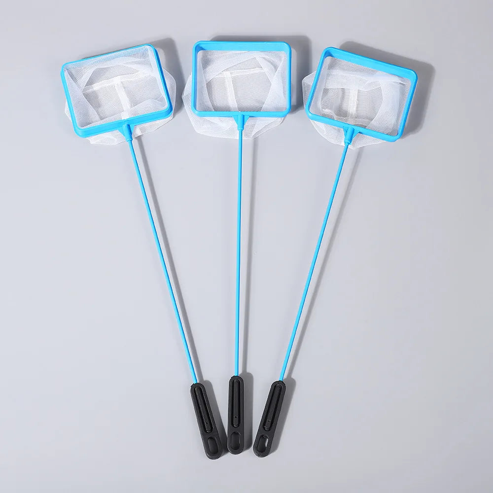 A pack of three blue soft mesh aquarium fish nets with non-slip handles displayed on a gray surface.