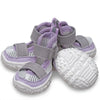 A pack of four purple and gray breathable anti-slip dog walking shoes for pets.