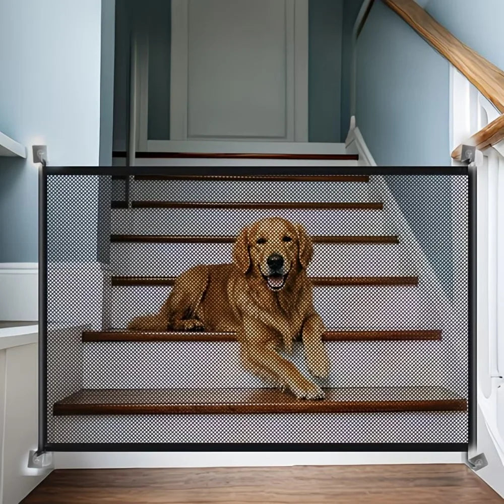 A heavy duty foldable pet gate with a wire mesh barrier installed on a wooden staircase.