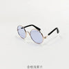 Vintage round pet sunglasses with gold-toned frames and blue lenses