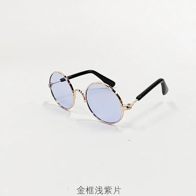 Vintage round pet sunglasses with gold-toned frames and blue lenses