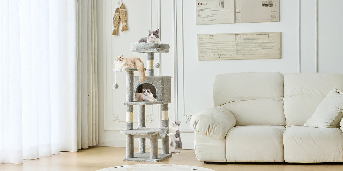 A multi-level sisal cat climbing tree with a gray structure and cats climbing on it, set in a bright room.