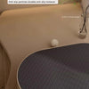 A gray sisal cat scratcher board with anti-slip particles is shown on a light surface.