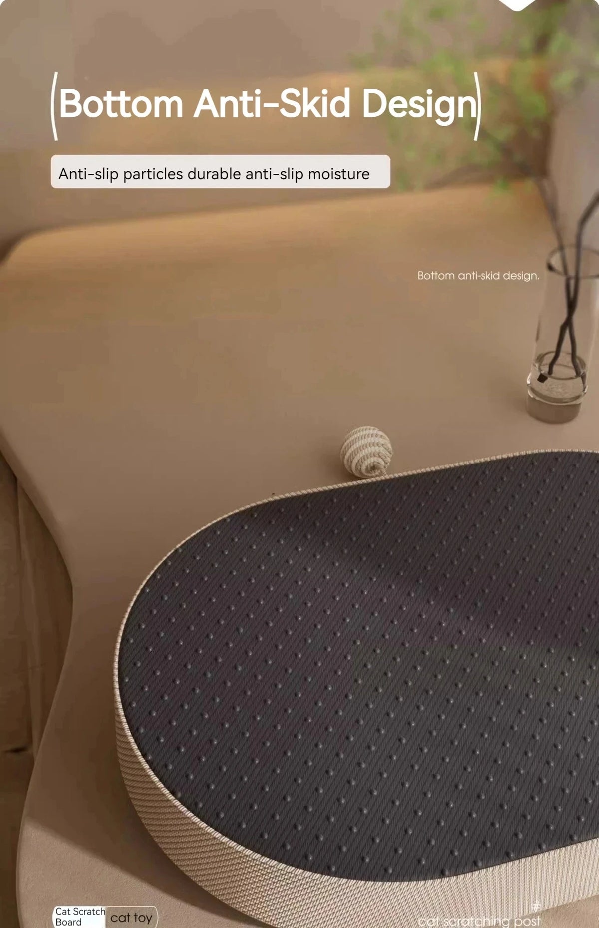 A gray sisal cat scratcher board with anti-slip particles is shown on a light surface.