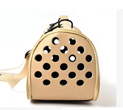 A beige breathable pet carrier bag with a perforated design for cats and small dogs.