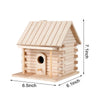 A light wood birdhouse with a pitched roof and door, showing its dimensions.