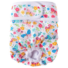 Reusable female dog diapers with colorful floral patterns and white trim.