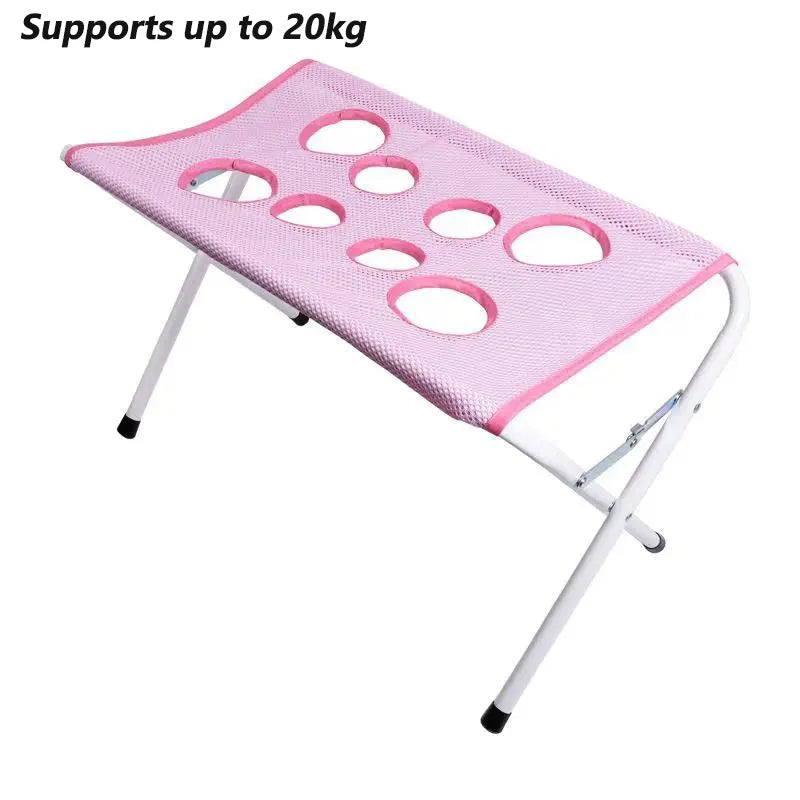 Hamaca plegable rosa para aseo de mascotas con múltiples agujeros para cortar uñas