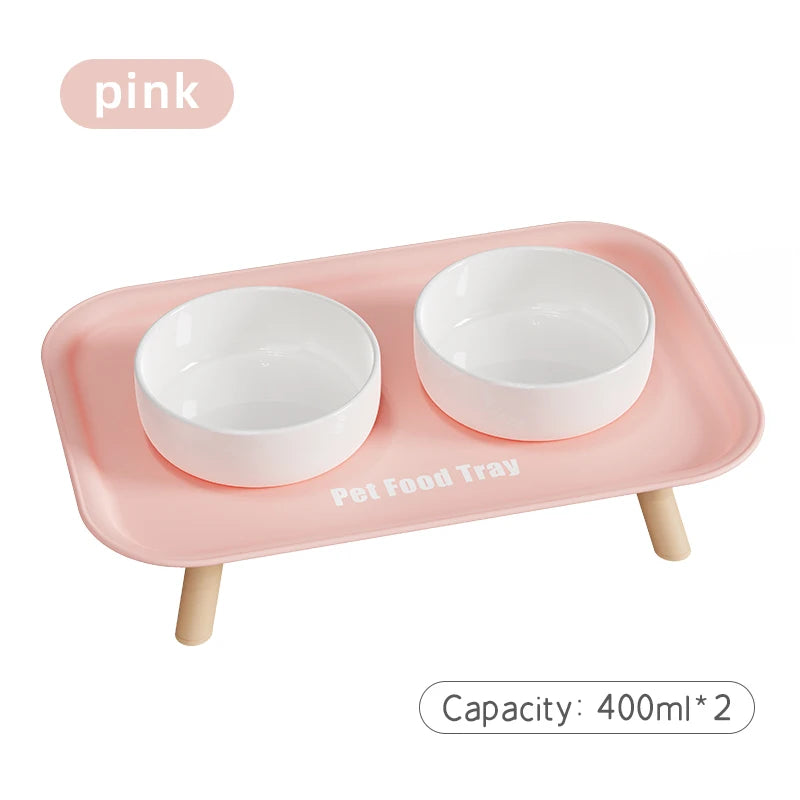 Pink pet food tray with two white bowls, capacity 400ml each.