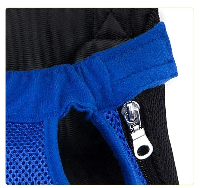 Close-up of a blue and black breathable mesh pet carrier backpack featuring a blue strap and silver zipper.